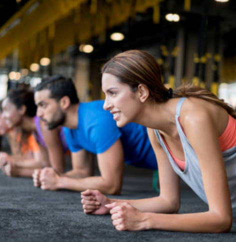Gym members taking a class