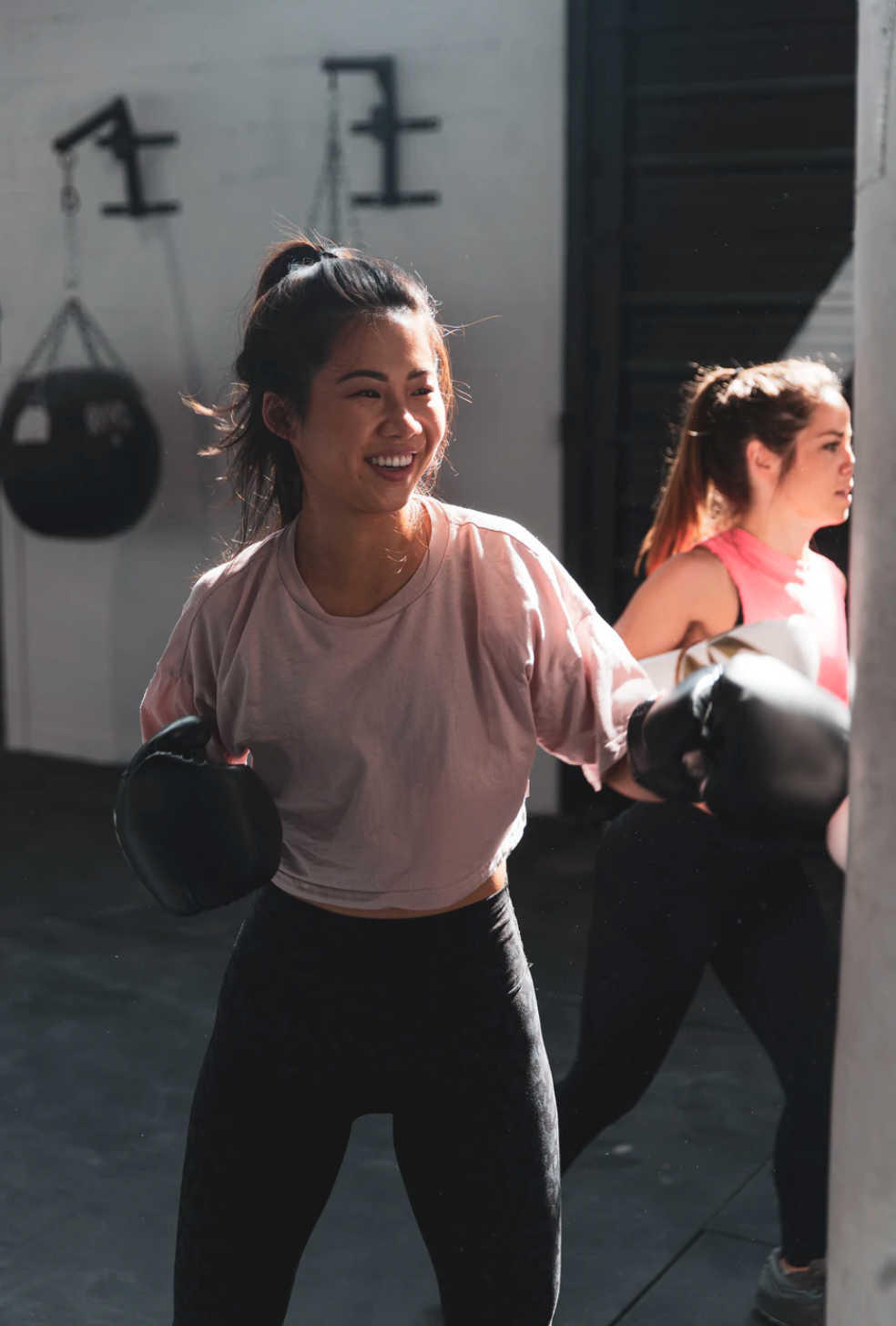 Woman boxing in gym